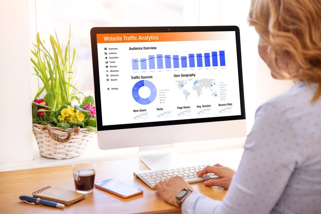 woman examining her organic traffic metrics